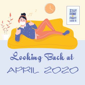 Looking Back at April 2020 woman with mask and headphones on sofa